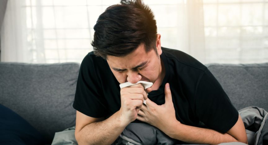 A photo of a man suffering from pertussis.