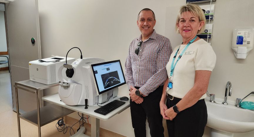 A picture of Karen McLellan and Carl Zeiss Pty Ltd representative Quinn Bent with the new Optical Coherence Tomography (OCT) machine at Longreach Hospital.